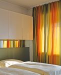 Eva Jandíková – Hotel Solitaire, Kocourovec, závěsy ze vzoru Slunce