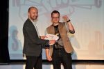 Pan proděkan předává cenu Maximu Yanbekovi